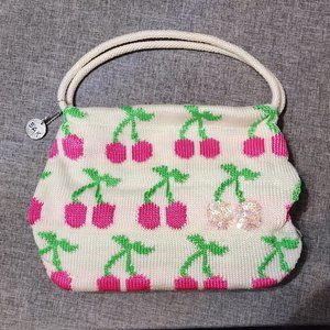 The SAK Cherry knit weave bag with sequin pearl